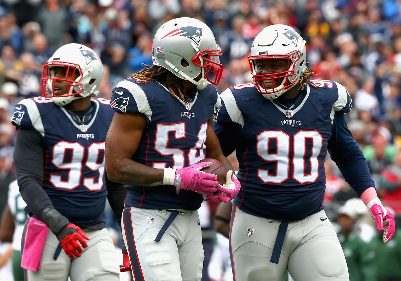 FOXBORO, MA - OCTOBER 25: Dont'a Hightower #54 of the New England Patriots reacts after recovering a fumble during the first quarter against the New York Jets at Gillette Stadium on October 25, 2015 in Foxboro, Massachusetts. (Photo by Jim Rogash/Getty Images)
