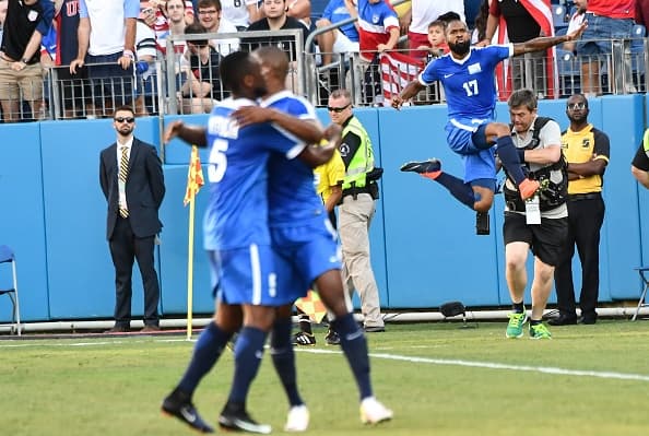 Martinique's Kevin Parsemain (R) celebrates scoring against Nicaragua during a Concacaf Gold Cup Group B match in Nashville, Tennessee, on July 8, 2017. / AFP PHOTO / NICHOLAS KAMM (Photo credit should read NICHOLAS KAMM/AFP/Getty Images)