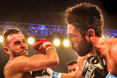 El puertorriqueño Christopher 'Pitufo' Díaz hizo vibrar a la fanaticada de su país presente en Florida. La víctima fue el mexicano Fernando Vargas quien, aunque terminó los 8 rounds, siempre fue dominado.