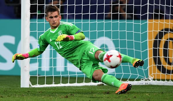 Germany's goalkeeper Julian Pollersbeck tries to make a save during penalty shooting during the UEFA U-21 European Championship football semi final match England v Germany in Tychy, Poland on June 27, 2017. / AFP PHOTO / PIOTR NOWAK (Photo credit should read PIOTR NOWAK/AFP/Getty Images)