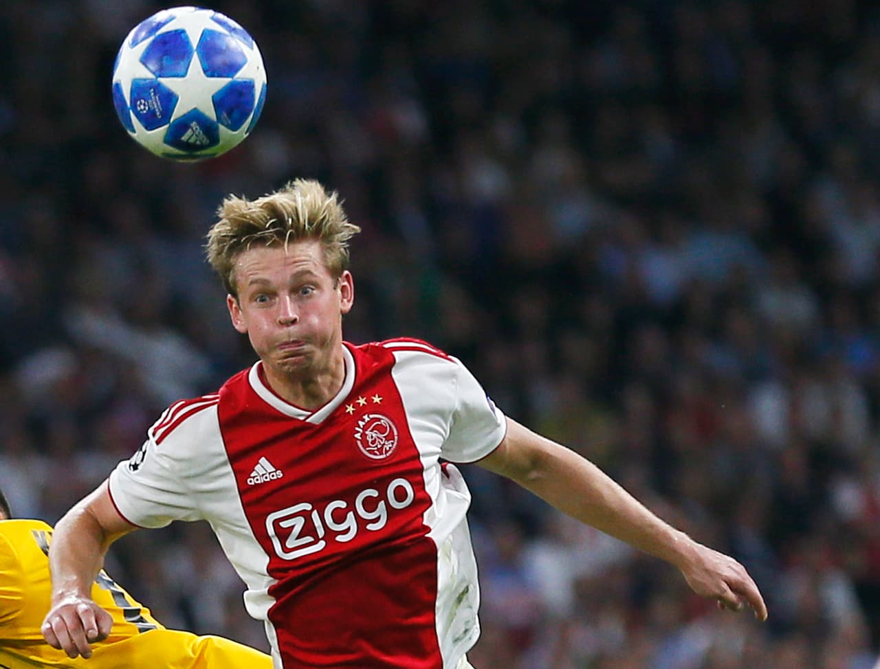 In this Wednesday, Sept. 19, 22018, image Ajax's Frankie de Jong heads the ball during a Group E Champions League soccer match between Ajax and AEK at the Johan Cruyff ArenA in Amsterdam, Netherlands. Dutch newspaper De Telegraaf reports Tuesday Sept. 25, 2018, that PSG, Manchester City, Bayern München, Tottenham Hotspur and FC Barcelona expressed their interest in de Jong after the Champions League match, and are now joined by Real Madrid and Manchester United. (AP Photo/Peter Dejong)