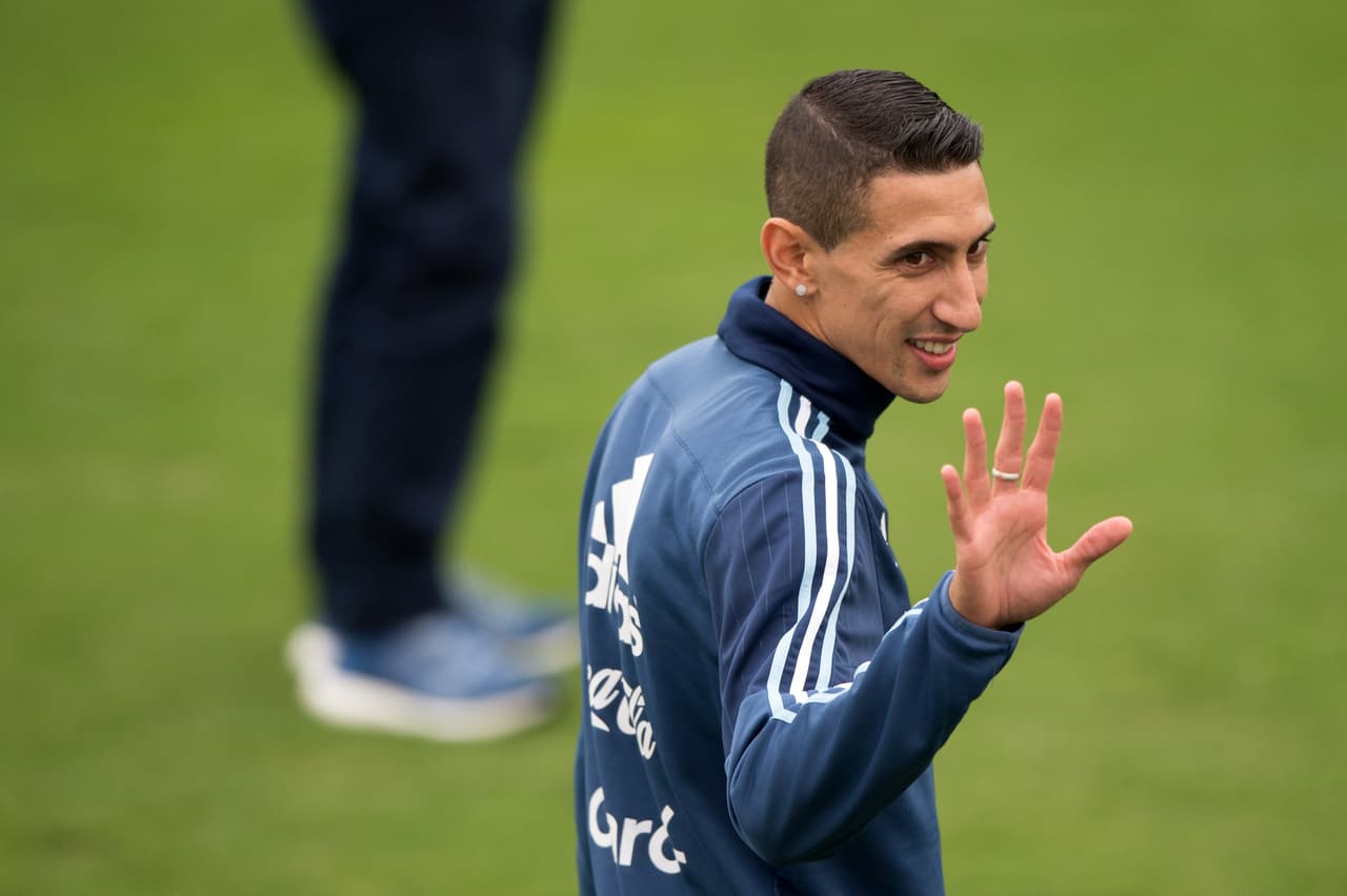 Argentina's national football team player Angel Di Maria waves to the press during a training session in Lima on October 03, 2016. Argentina will face Peru in a FIFA World Cup Russia 2018 qualifier match on October 6. / AFP / ERNESTO BENAVIDES (Photo credit should read ERNESTO BENAVIDES/AFP/Getty Images)