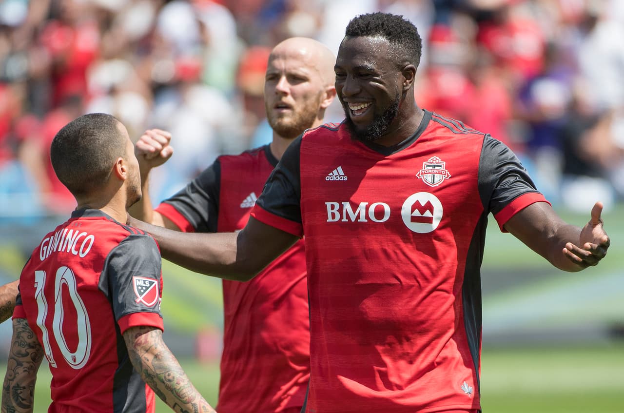 Jul 30, 2017; Toronto, Ontario, CAN; Toronto FC forward Sebastian Giovinco (10) celebrates scoring a goal with Toronto FC forward Jozy Altidore (17) in the first half during a game against New York FC at BMO Field. Mandatory Credit: Nick Turchiaro-USA TODAY Sports
