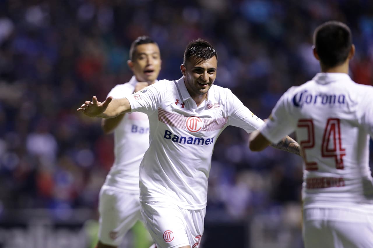 Action photo during the match Puebla vs Toluca at Cuauhtemoc Stadium, Apertura 2016 MX Cup. -- Foto de accion durante el Puebla vs Toluca en el Estadio Cuauhtemoc, Partido Correspondiente a los Cuartos de Final del Torneo Apertura 2016 Copa MX, en la foto: Festejo de gol de Enrique Triverio ---19/10/2016/MEXSPORT/