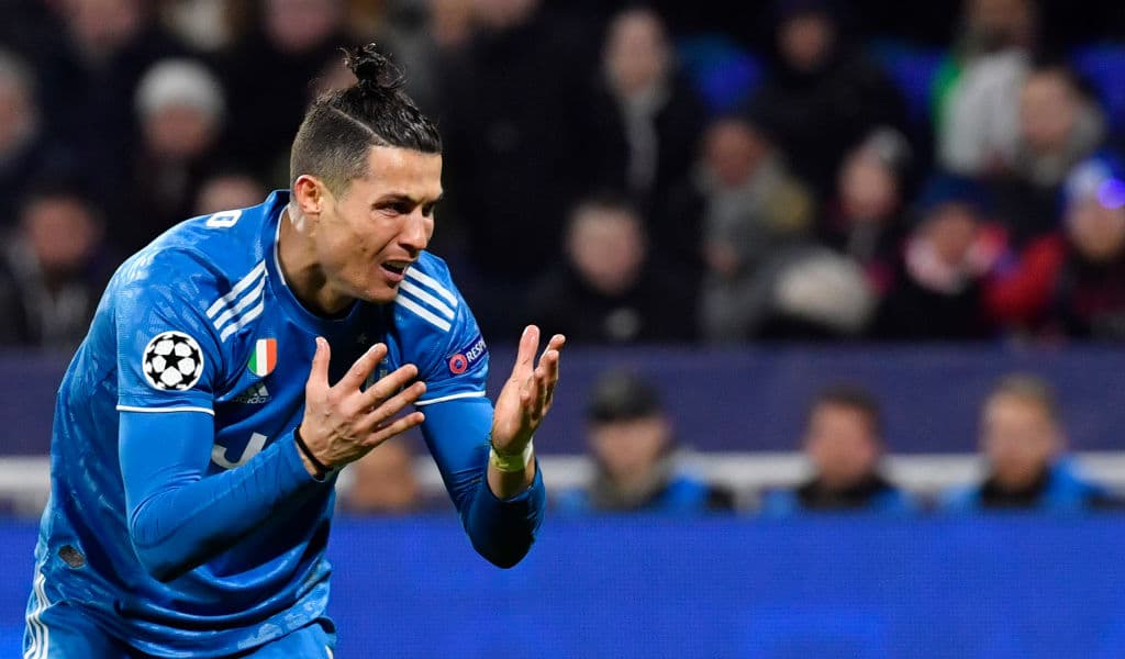 Juventus' Portuguese forward Cristiano Ronaldo reacts during the UEFA Champions League round of 16 first-leg football match between Lyon and Juventus at the Parc Olympique Lyonnais stadium in Decines-Charpieu, central-eastern France, on February 26, 2020. (Photo by Philippe DESMAZES / AFP) (Photo by PHILIPPE DESMAZES/AFP via Getty Images)