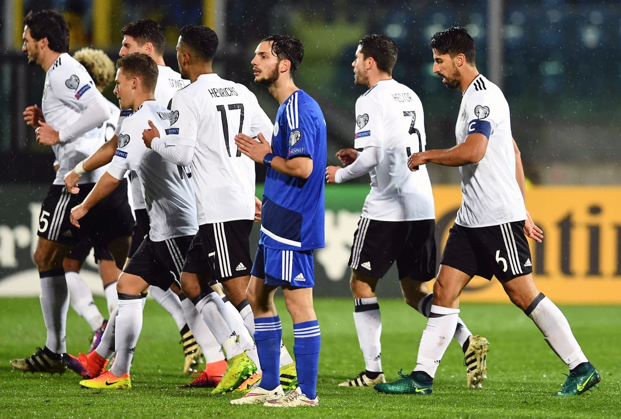 Germany's midfielder and captain Sami Khedira (R) celebrates with teammates after scoring a goal during the World Cup 2018 qualifying football match between San Marino and Germany on November 11, 2016 at the San Marino stadium in Serravalle. / AFP / VINCENZO PINTO (Photo credit should read VINCENZO PINTO/AFP/Getty Images)