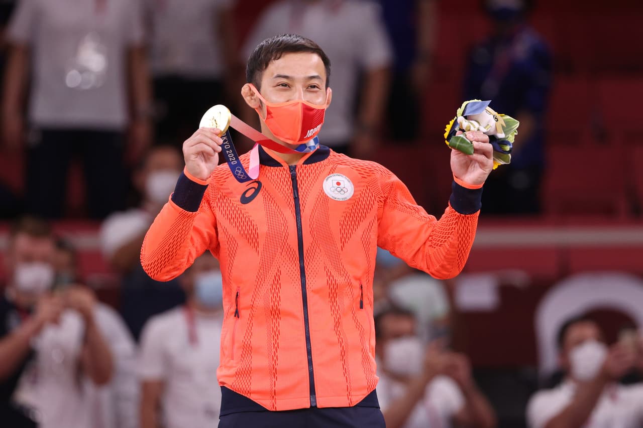 TOKYO, JAPAN - JULY 24: Naohisa Takato of Team Japan, poses with the gold medal for the Men’s Judo 60kg Final on day one of the Tokyo 2020 Olympic Games at Nippon Budokan on July 24, 2021 in Tokyo, Japan. (Photo by Harry How/Getty Images)