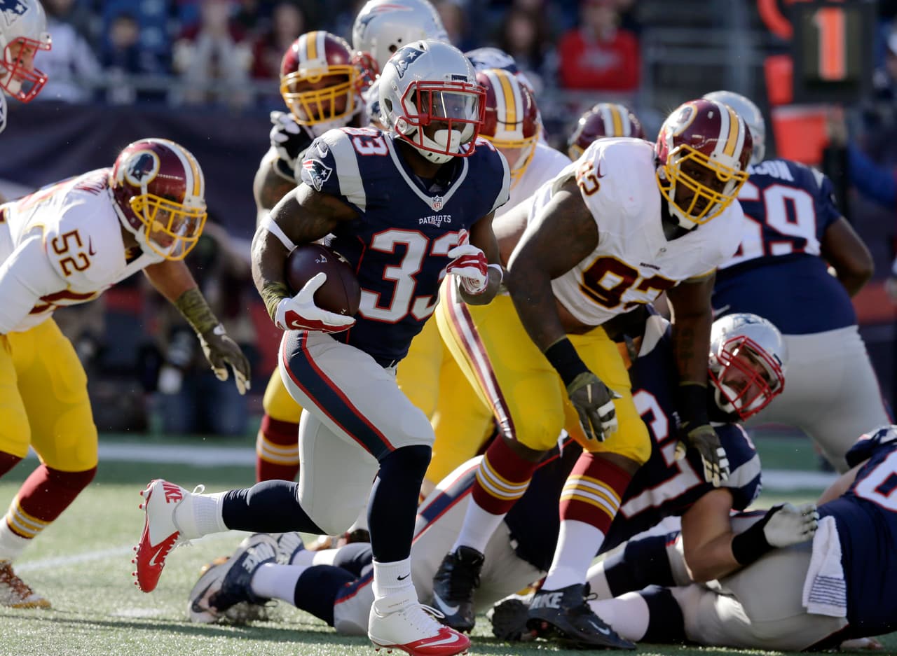 Los Patriots arrollaron a los Redskins 27-10 para mantener la racha ganadora de 8-0 en la temporada. Checa las mejores tomas del partido.