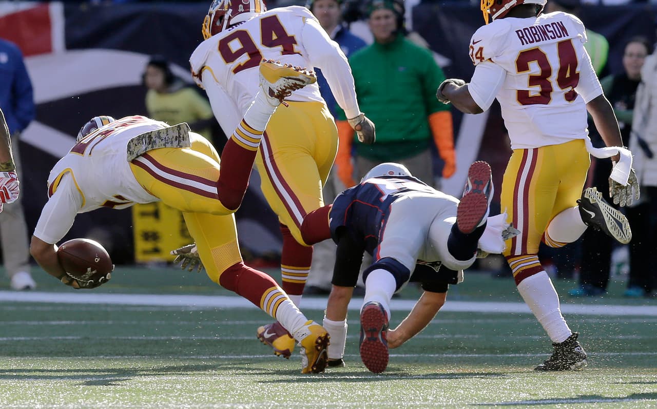 Los Patriots arrollaron a los Redskins 27-10 para mantener la racha ganadora de 8-0 en la temporada. Checa las mejores tomas del partido.