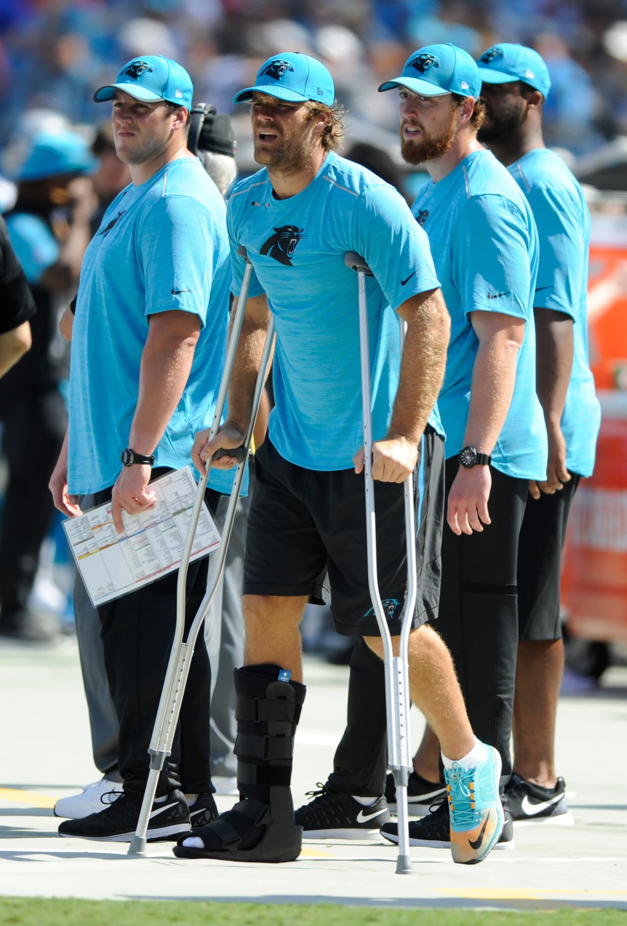 Carolina Panthers' Greg Olsen stands on crutches in the second half of an NFL football game against the Buffalo Bills in Charlotte, N.C., Sunday, Sept. 17, 2017. (AP Photo/Mike McCarn)
