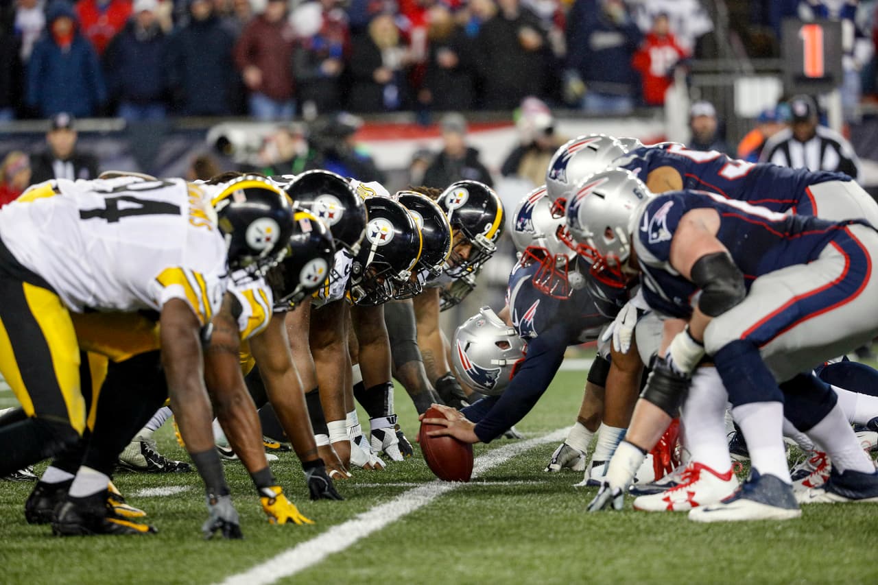 The Pittsburgh Steelers defense gets set at the line of scrimmage in action against the New England Patriots offense during the NFL AFC Championship football game on Sunday, Jan. 22, 2017 in Foxborough, Mass. The Patriots defeated the Steelers 36-17. (G. Newman Lowrance via AP)