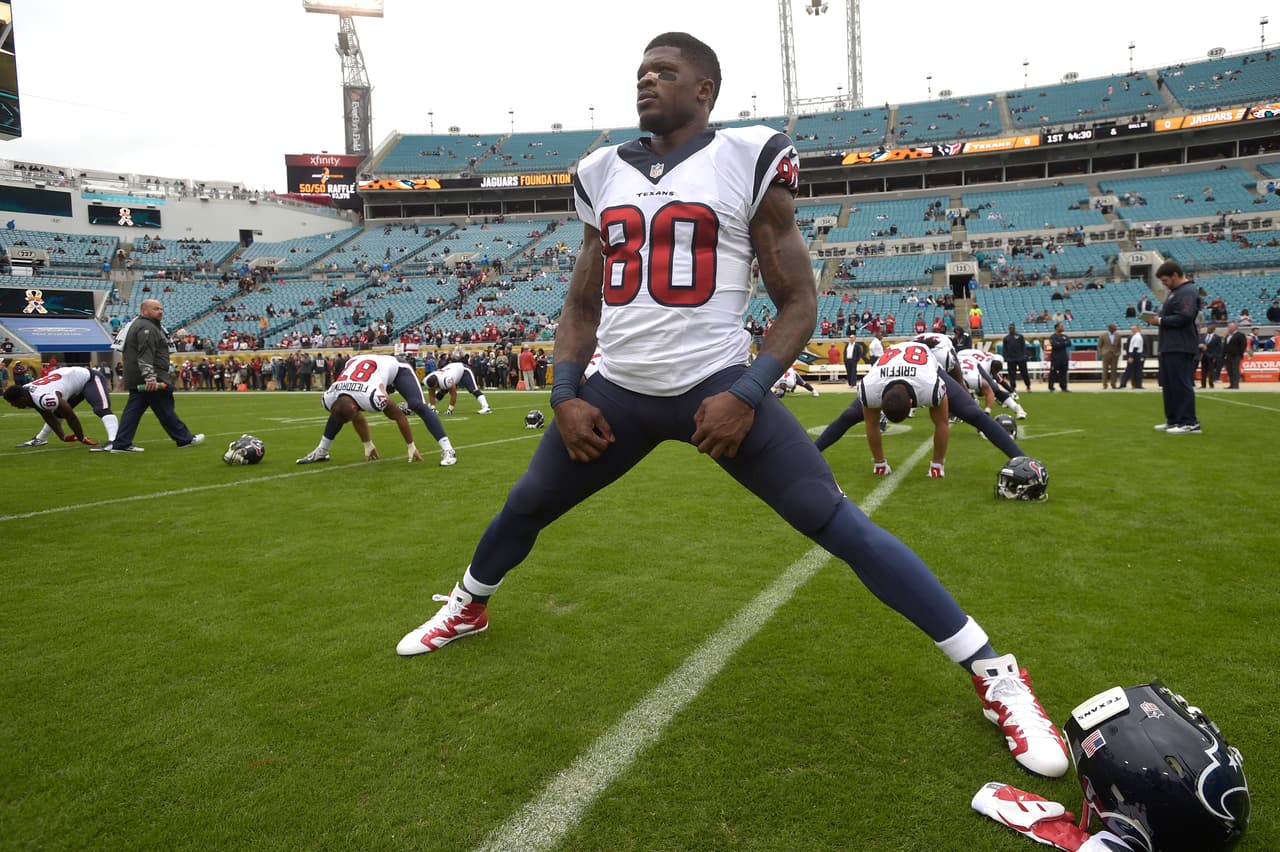 Houston Texans wide receiver Andre Johnson (80) stretches during warmups before an NFL football game against the Jacksonville Jaguars in Jacksonville, Fla., Sunday, Dec. 7, 2014.(AP Photo/Phelan M. Ebenhack)