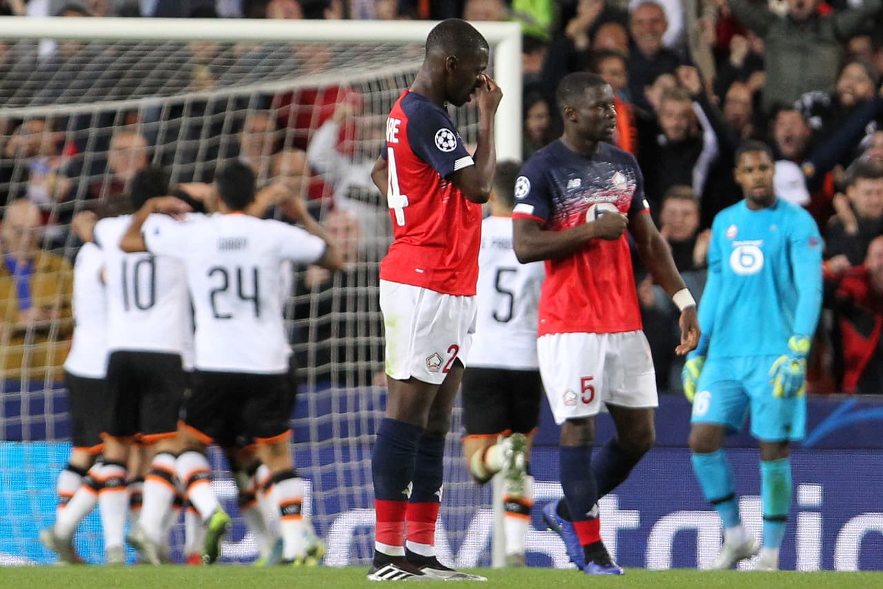 Borussia Dortmund 3-2Inter; Olympique de Lyon 3-1 Benfica; Valencia 4-1 Lille.