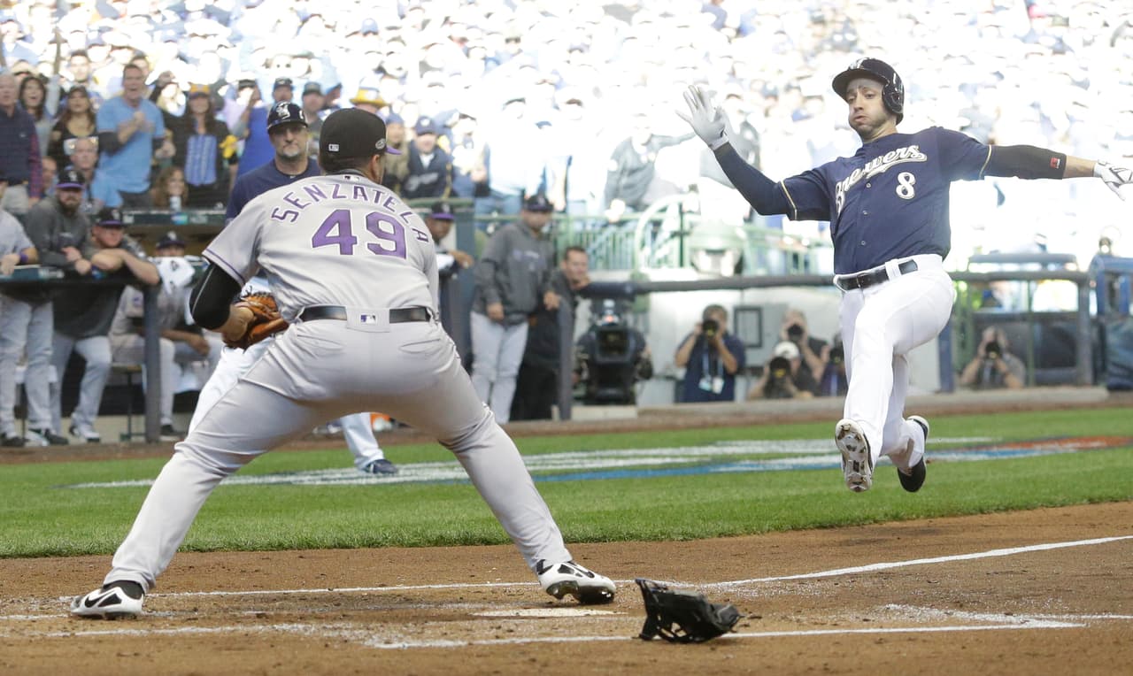 En el cierre de la primera entrada, en un wild pitch del abridor de Colorado Antonio Senzatela, Ryan Braun decidió ir al plato pero del 2 al 1 fue puesto out en home y le negó la carrera.