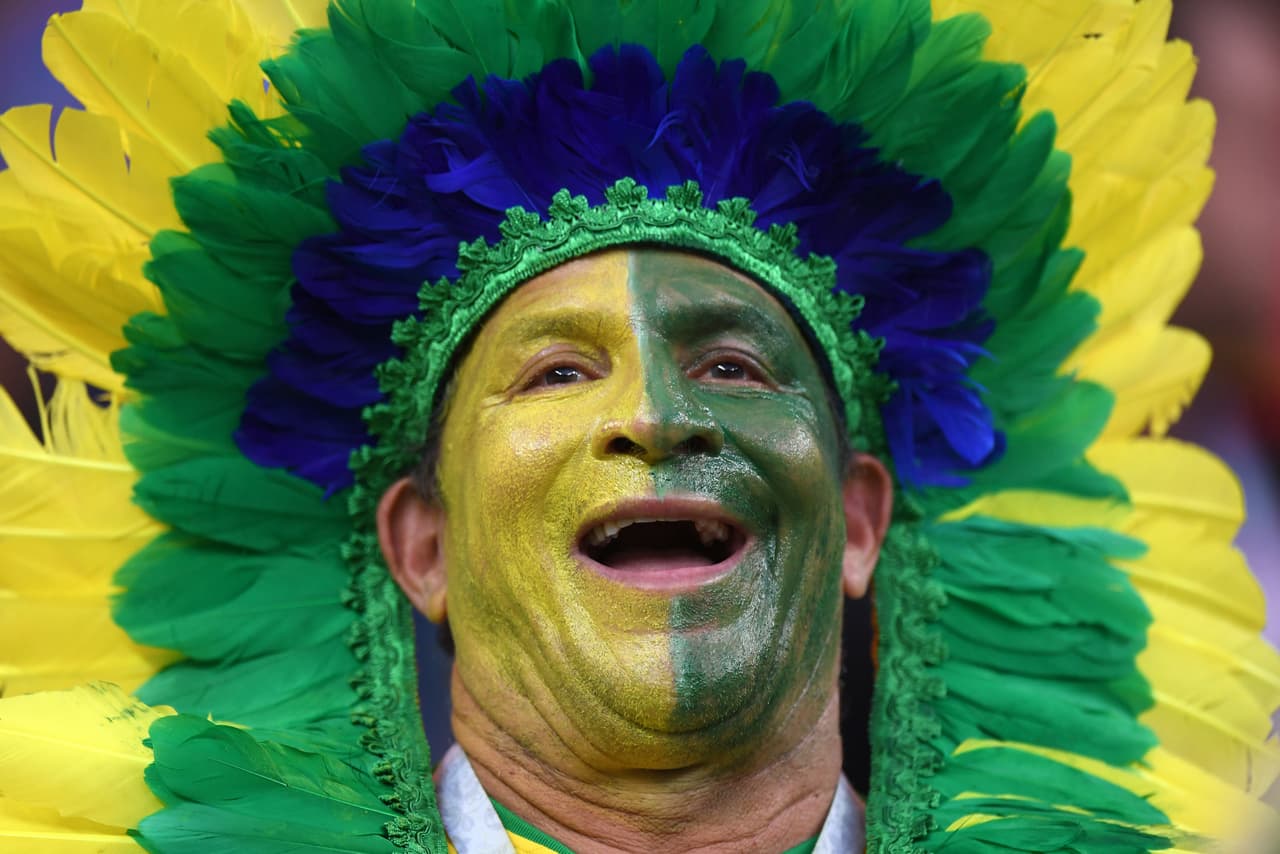 ROSTOV-ON-DON, RUSSIA - JUNE 17: A Brazil fan enjoys the pre match atmosphere prior to the 2018 FIFA World Cup Russia group E match between Brazil and Switzerland at Rostov Arena on June 17, 2018 in Rostov-on-Don, Russia. (Photo by Shaun Botterill/Getty Images)