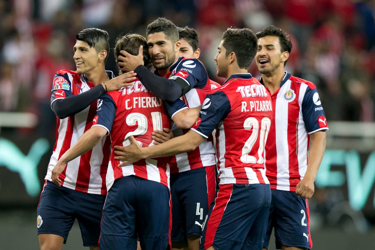 GUADALAJARA, MEXICO - FEBRUARY 02: Carlos Fierro of Chivas celebrates with teammates after scoring the winning penalty in a friendly match between Chivas and Boca Juniors at Chivas Stadium on February 02, 2017 in Zapopan, Mexico. (Photo by Refugio Ruiz/LatinContent/Getty Images)