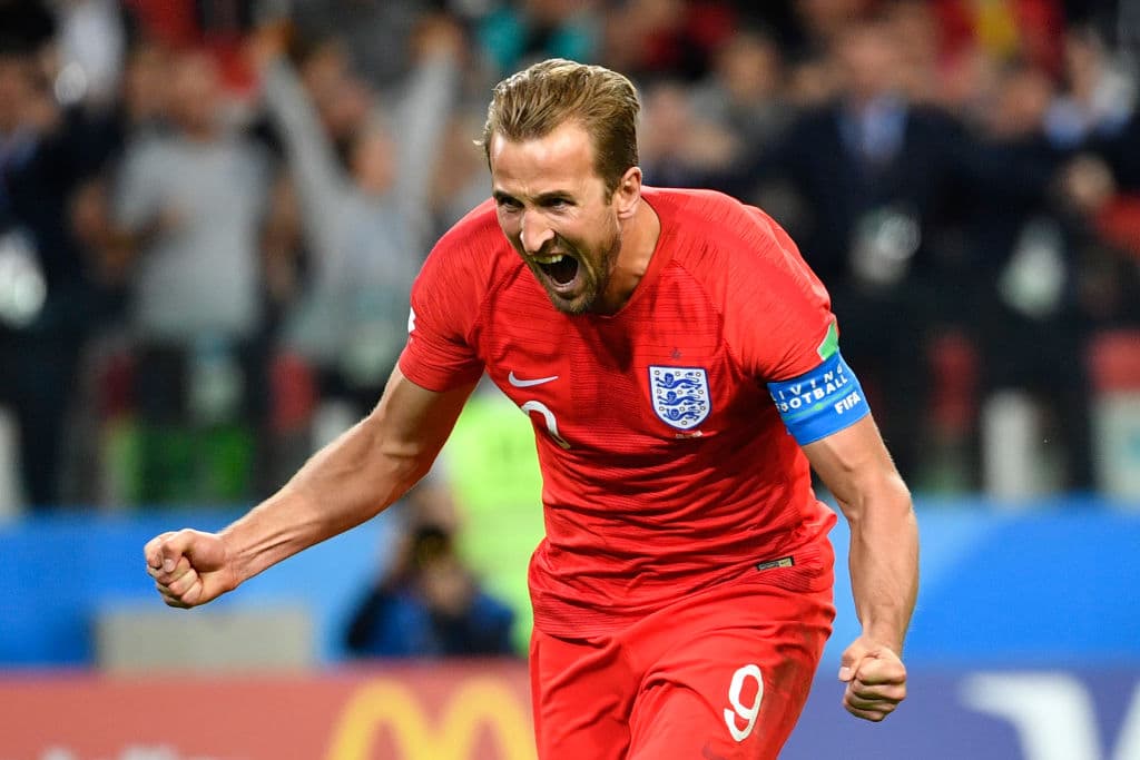 TOPSHOT - England's forward Harry Kane celebrates after scoring the opening goal from the penalty spot during the Russia 2018 World Cup round of 16 football match between Colombia and England at the Spartak Stadium in Moscow on July 3, 2018. (Photo by Alexander NEMENOV / AFP) / RESTRICTED TO EDITORIAL USE - NO MOBILE PUSH ALERTS/DOWNLOADS (Photo credit should read ALEXANDER NEMENOV/AFP/Getty Images)