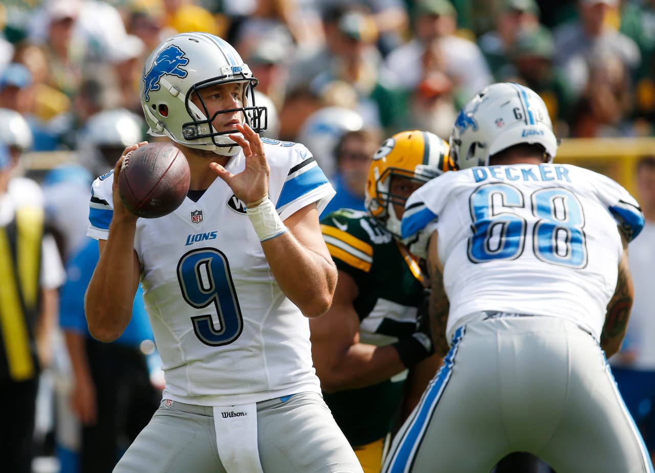 Detroit Lions' Matthew Stafford throws during the first half of an NFL football game against the Green Bay Packers Sunday, Sept. 25, 2016, in Green Bay, Wis. (AP Photo/Mike Roemer)