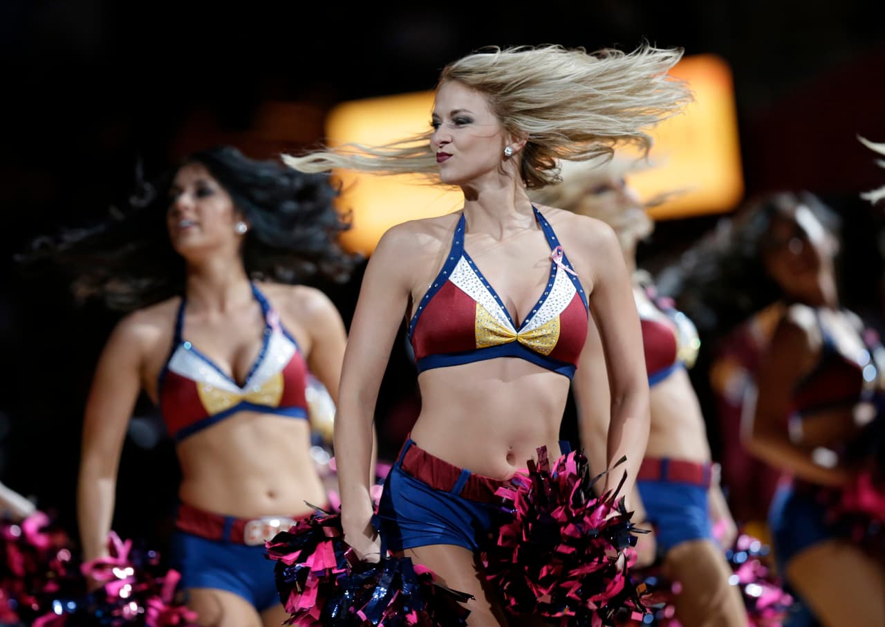 The Cleveland Cavaliers cheerleaders performs in the first half of an NBA preseason basketball game between the Dallas Mavericks' and the Cleveland Cavaliers, Monday, Oct. 19, 2015, in Cleveland. (AP Photo/Tony Dejak)