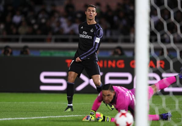 YOKOHAMA, JAPAN - DECEMBER 15: Cristiano Ronaldo of Real Madrid shoots wide of goal during the FIFA Club World Cup Semi Final match between Club America and Real Madrid at International Stadium Yokohama on December 15, 2016 in Yokohama, Japan. (Photo by Matthew Ashton - AMA/Getty Images)