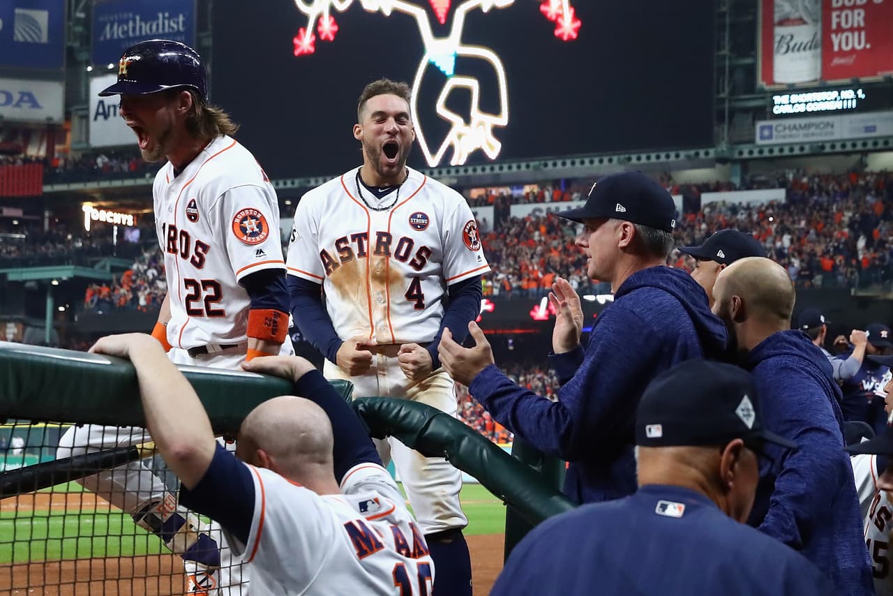 HOUSTON, TX - OCTOBER 29: George Springer #4 of the Houston Astros reacts after a run during the seventh inning against the Los Angeles Dodgers in game five of the 2017 World Series at Minute Maid Park on October 29, 2017 in Houston, Texas. (Photo by Christian Petersen/Getty Images)
