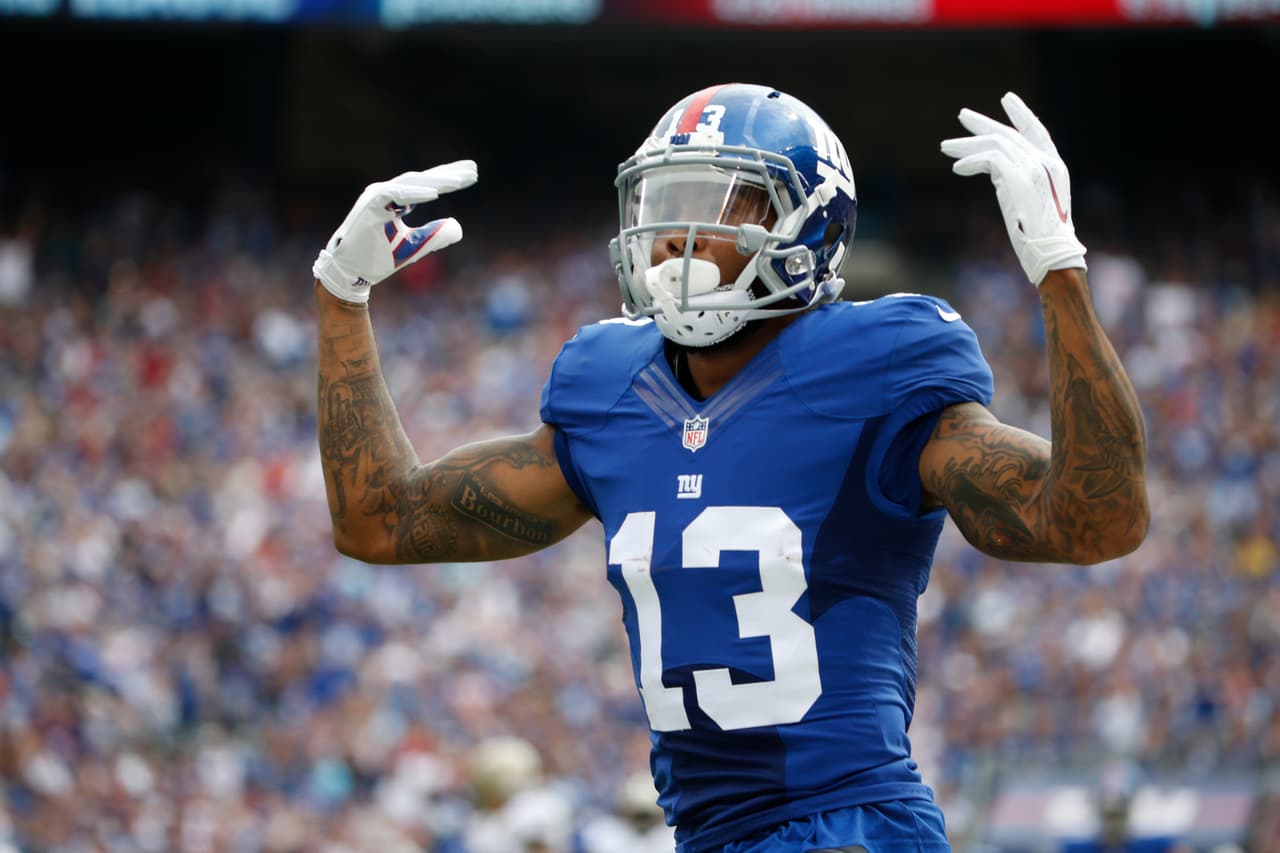 New York Giants wide receiver Odell Beckham (13) reacts after a play during the first half of an NFL football game against the New Orleans Saints Sunday, Sept. 18, 2016, in East Rutherford, N.J. (AP Photo/Kathy Willens)