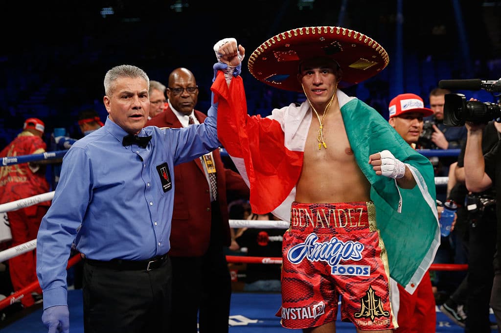 David Benavidez, de sangre mexicana y campeón supermediano del CMB, sostendrá su segundo pleito ante Ronald Gavril como parte de la cartelera García-Ríos. El oriundo de Phoenix, AZ, se mantiene invicto en 19 peleas.