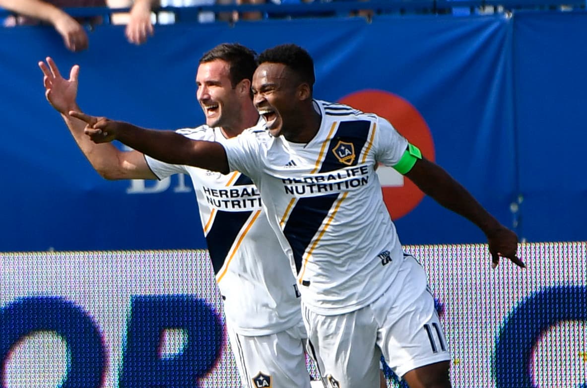 May 21, 2018; Montreal, Quebec, CAN; Los Angeles Galaxy forward Ola Kamara (11) reacts with teammates after scoring a goal against the Montreal Impact during the second half at Stade Saputo. Mandatory Credit: Eric Bolte-USA TODAY Sports