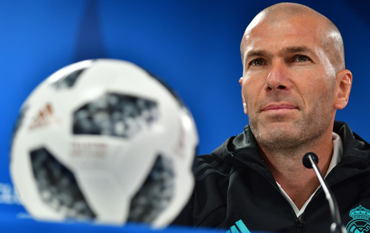 Real Madrid coach Zinedine Zidane attends a press conference on the eve of their FIFA Club World Cup final match against Brazilian Gremio club in the Emirati capital Abu Dhabi on December 15, 2017. / AFP PHOTO / Giuseppe CACACE (Photo credit should read GIUSEPPE CACACE/AFP/Getty Images)