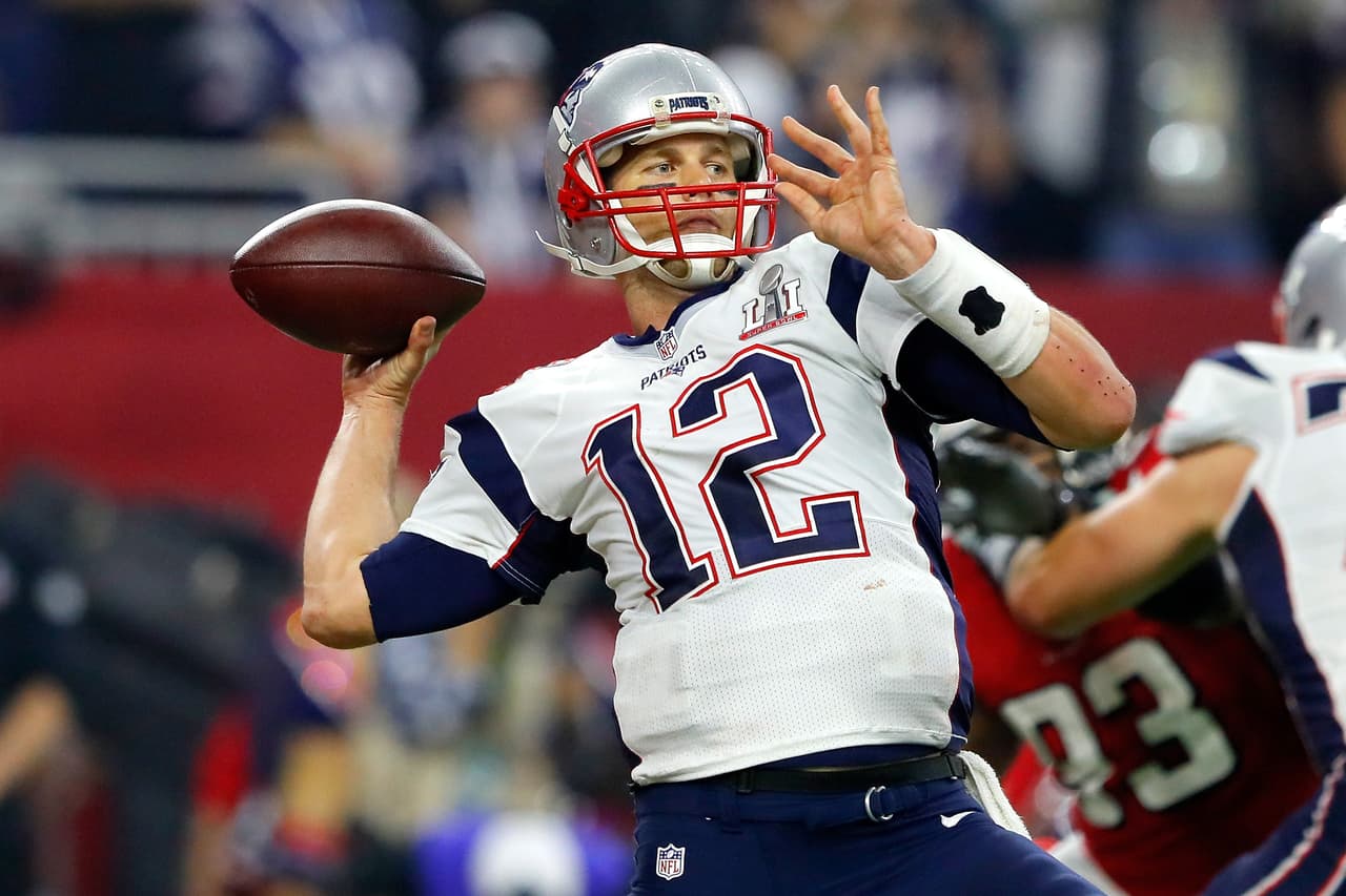 HOUSTON, TX - FEBRUARY 05: Tom Brady #12 of the New England Patriots attempts a pass during the fourth quarter against the Atlanta Falcons during Super Bowl 51 at NRG Stadium on February 5, 2017 in Houston, Texas. (Photo by Kevin C. Cox/Getty Images)