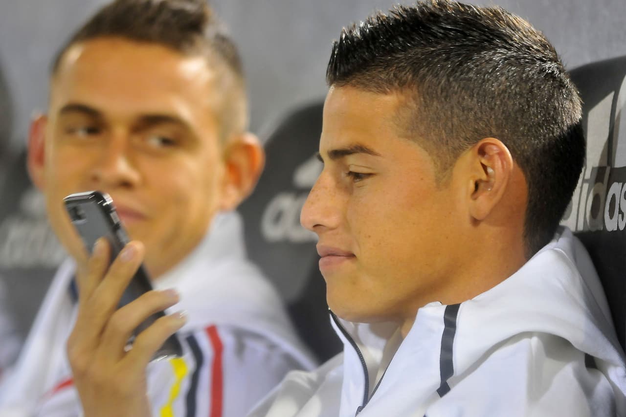 ASUNCION, PARAGUAY - OCTOBER 06: James Rodriguez of Colombia is seen on the phone before a match between Paraguay and Colombia as part of FIFA 2018 World Cup Qualifiers at Defensores del Chaco Stadium on October 06, 2016 in Asuncion, Paraguay. (Photo by Fernando Calistro/LatinContent/Getty Images)