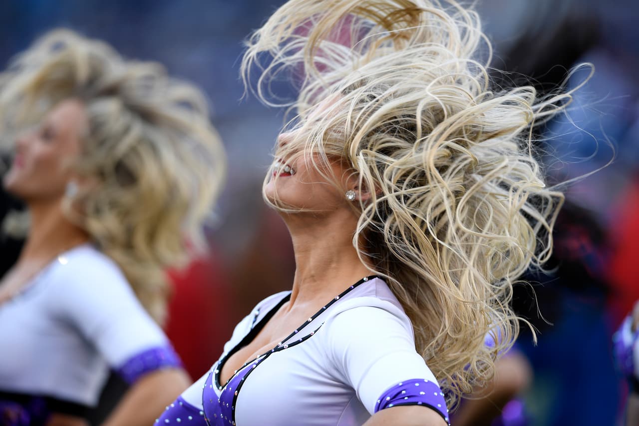 A Baltimore Ravens cheerleader performs in the first half of an NFL wild card playoff football game between the Ravens and the Los Angeles Chargers, Sunday, Jan. 6, 2019, in Baltimore. (AP Photo/Nick Wass)