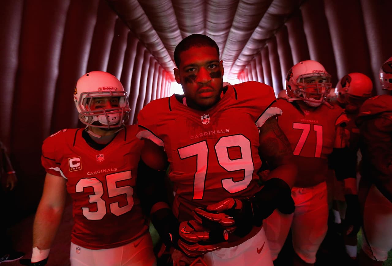GLENDALE, AZ - SEPTEMBER 09: defensive tackle David Carter #79 of the Arizona Cardinals prepares to take the field before the season opener against the Seattle Seahawks at the University of Phoenix Stadium on September 9, 2012 in Glendale, Arizona. The Cardinals defeated the Seahawks 20-16. (Photo by Christian Petersen/Getty Images)