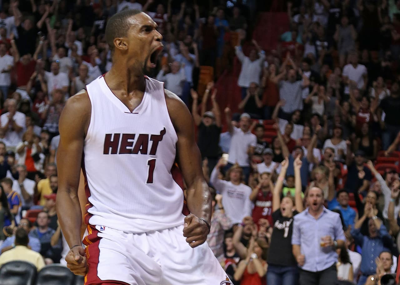 MIAMI, FL - NOVEMBER 01: Chris Bosh #1 of the Miami Heat reacts to a play during a game against the Houston Rockets at American Airlines Arena on November 1, 2015 in Miami, Florida. NOTE TO USER: User expressly acknowledges and agrees that, by downloading and/or using this photograph, user is consenting to the terms and conditions of the Getty Images License Agreement. Mandatory copyright notice: (Photo by Mike Ehrmann/Getty Images)