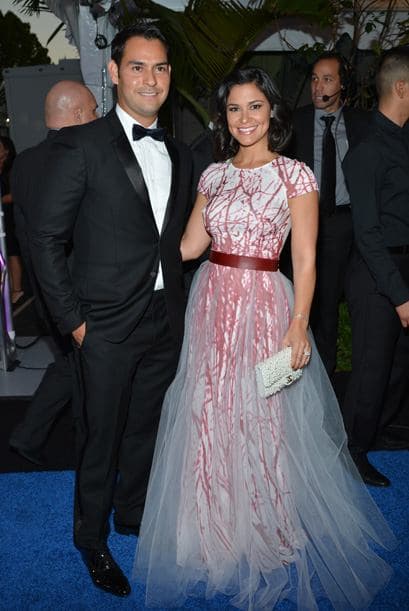 El estelar lanzador venezolano de los Tigres de detroit Aníbal Sánchez acompañado de su esposa. Una pareja muy elegante.