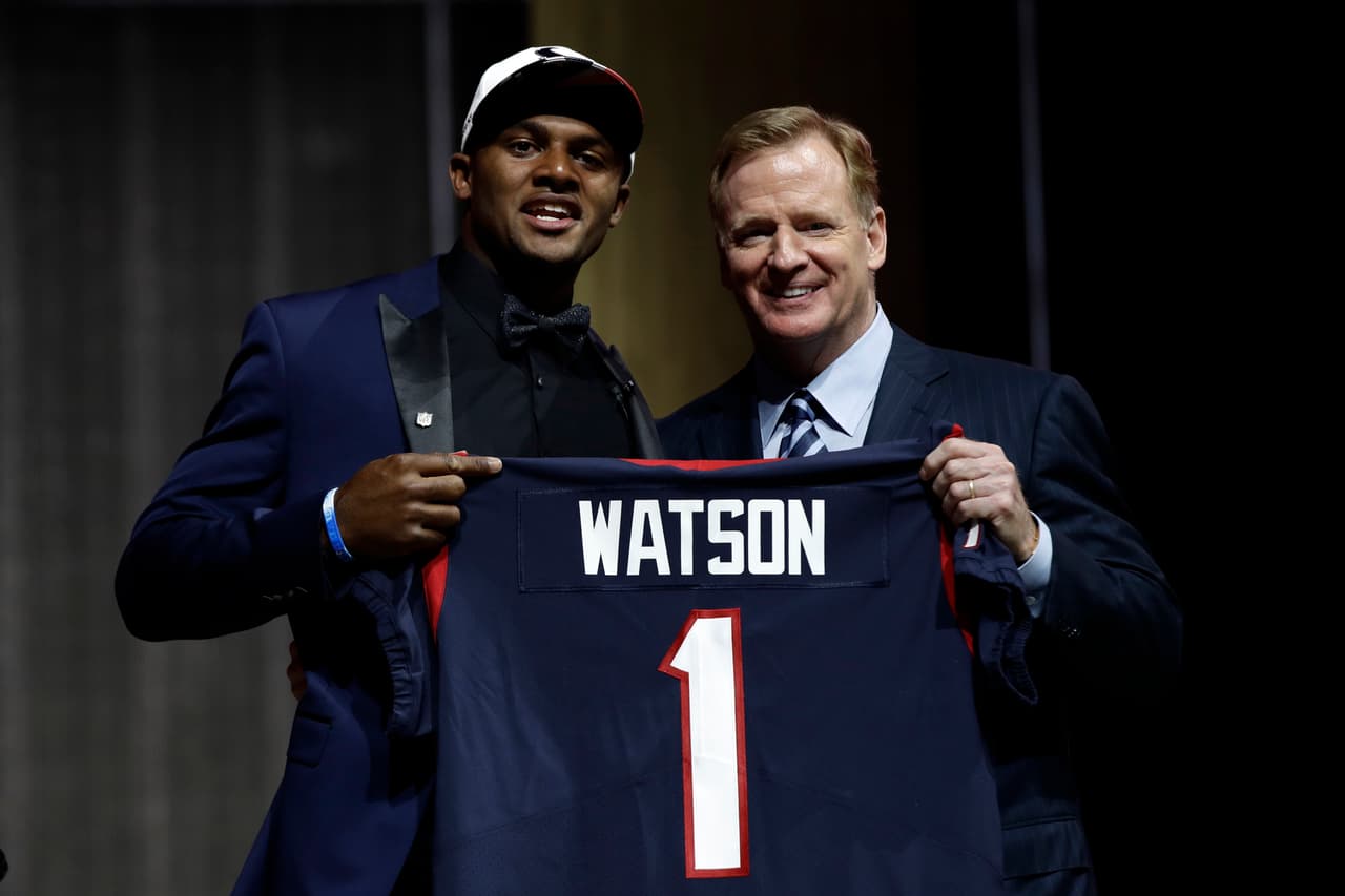 Clemson's Deshaun Watson, left, poses with NFL commissioner Roger Goodell after being selected by the Houston Texans during the first round of the 2017 NFL football draft, Thursday, April 27, 2017, in Philadelphia. (AP Photo/Matt Rourke)