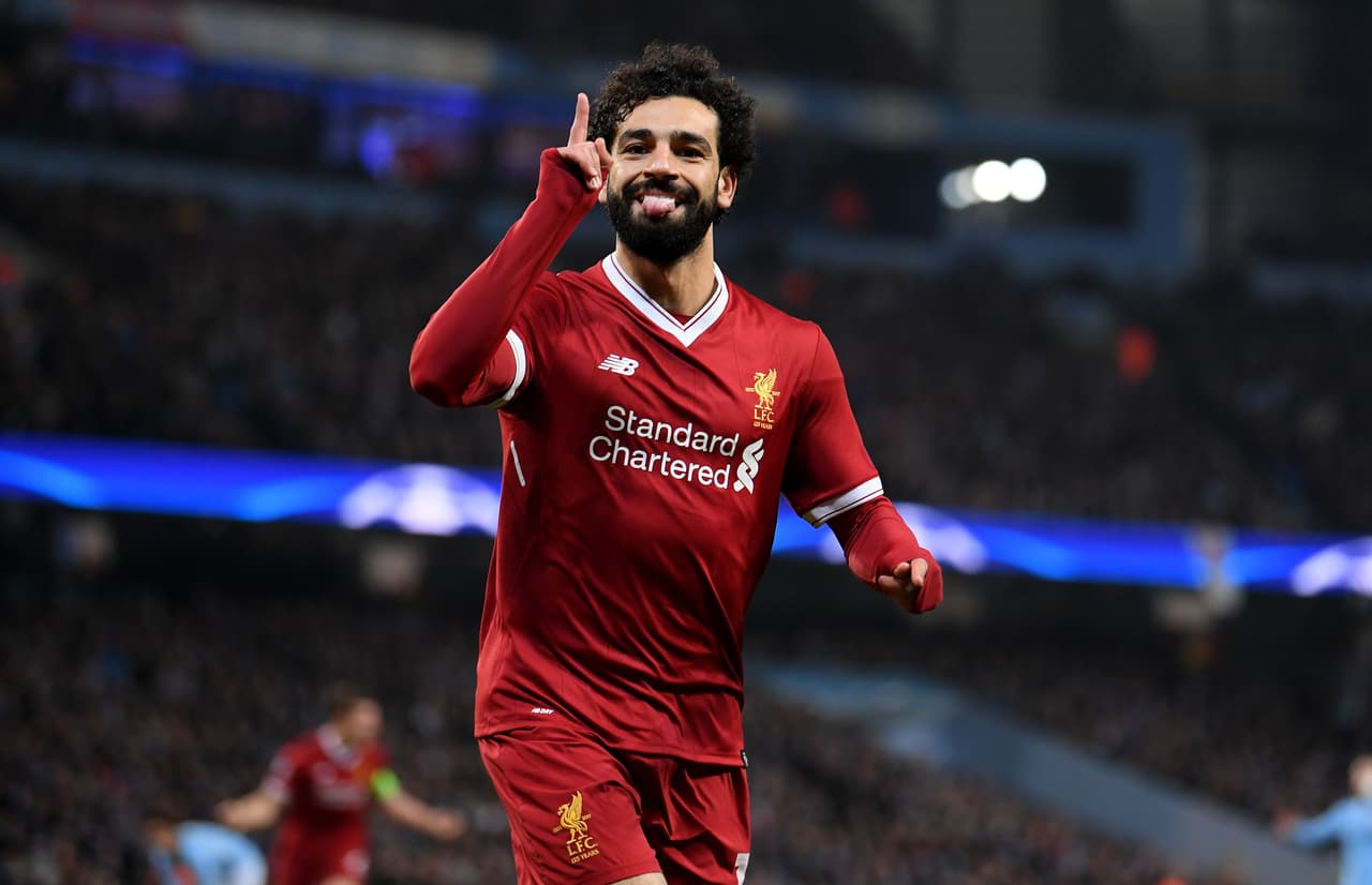 MANCHESTER, ENGLAND - APRIL 10: Mohamed Salah of Liverpool celebrates after scoring his sides first goal during the UEFA Champions League Quarter Final Second Leg match between Manchester City and Liverpool at Etihad Stadium on April 10, 2018 in Manchester, England. (Photo by Laurence Griffiths/Getty Images,)