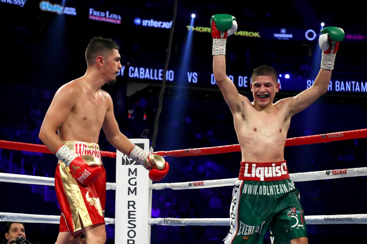 LAS VEGAS, NV - SEPTEMBER 16: (R-L) Diego De La Hoya celebrates after the final round against Randy Caballero during their super bantamweight bout at T-Mobile Arena on September 16, 2017 in Las Vegas, Nevada. (Photo by Al Bello/Getty Images)