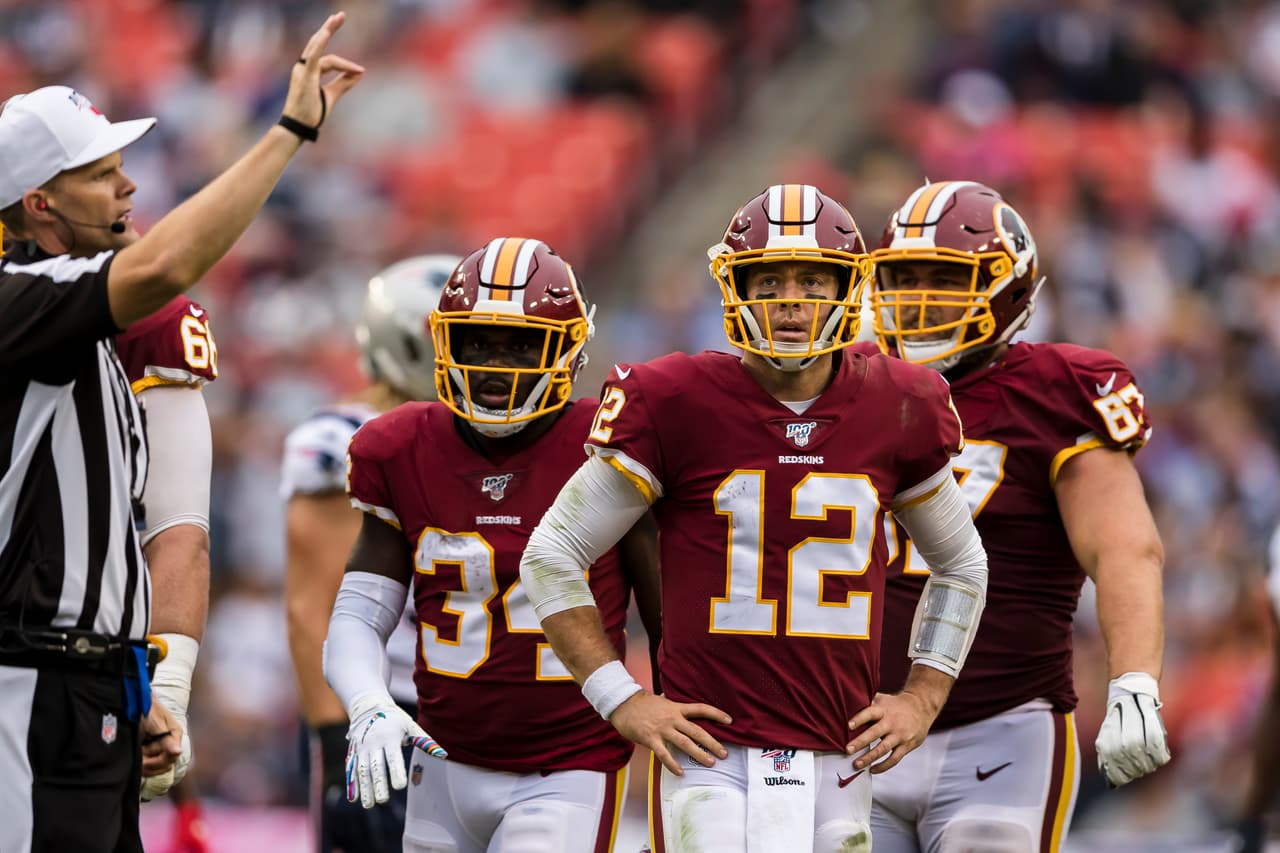 LANDOVER, MD - OCTOBER 06: Colt McCoy #12 of the Washington Redskins looks on after an offensive penalty against the New England Patriots during the second half at FedExField on October 6, 2019 in Landover, Maryland. (Photo by Scott Taetsch/Getty Images)