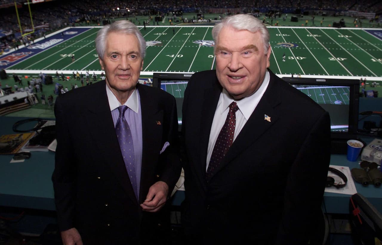 John conformó una gran dupla junto a Pat Summerall en los medios de comunicación y en sus transmisiones. Su última aparición juntos fuee en el Super Bowl XXXVI en New Orleans durante el juego entre Patriots y Rams.