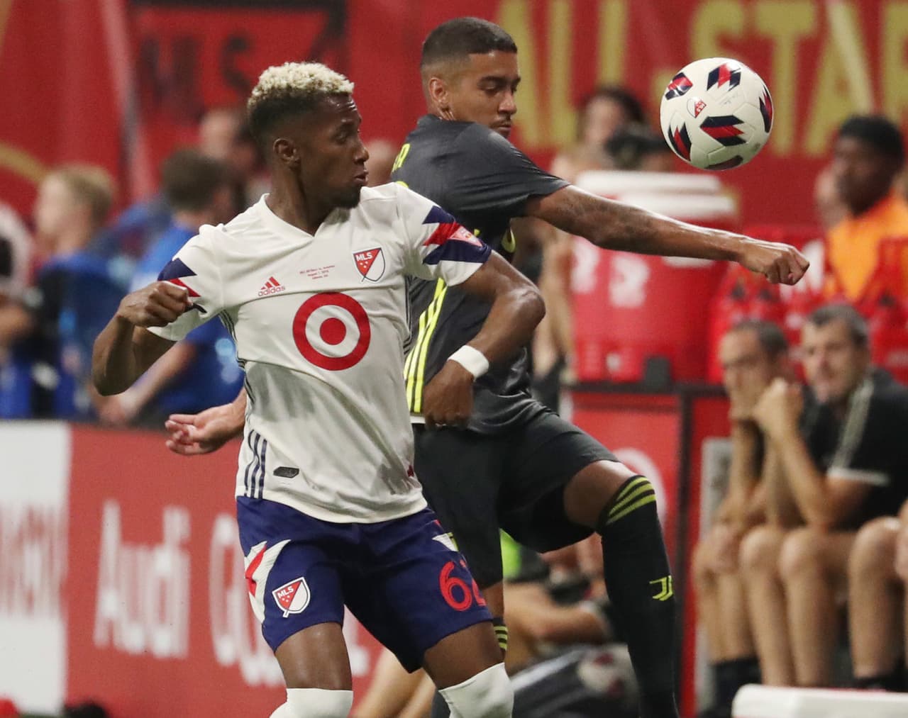 Aug 1, 2018; Atlanta, GA, USA; MLS defenseman Michael Amir Murillo (62) battles for the ball with Juventus midfielder Matheus Pereira (40) in the first half in the 2018 MLS All Star Game at Mercedes-Benz Stadium. Mandatory Credit: Jason Getz-USA TODAY Sports