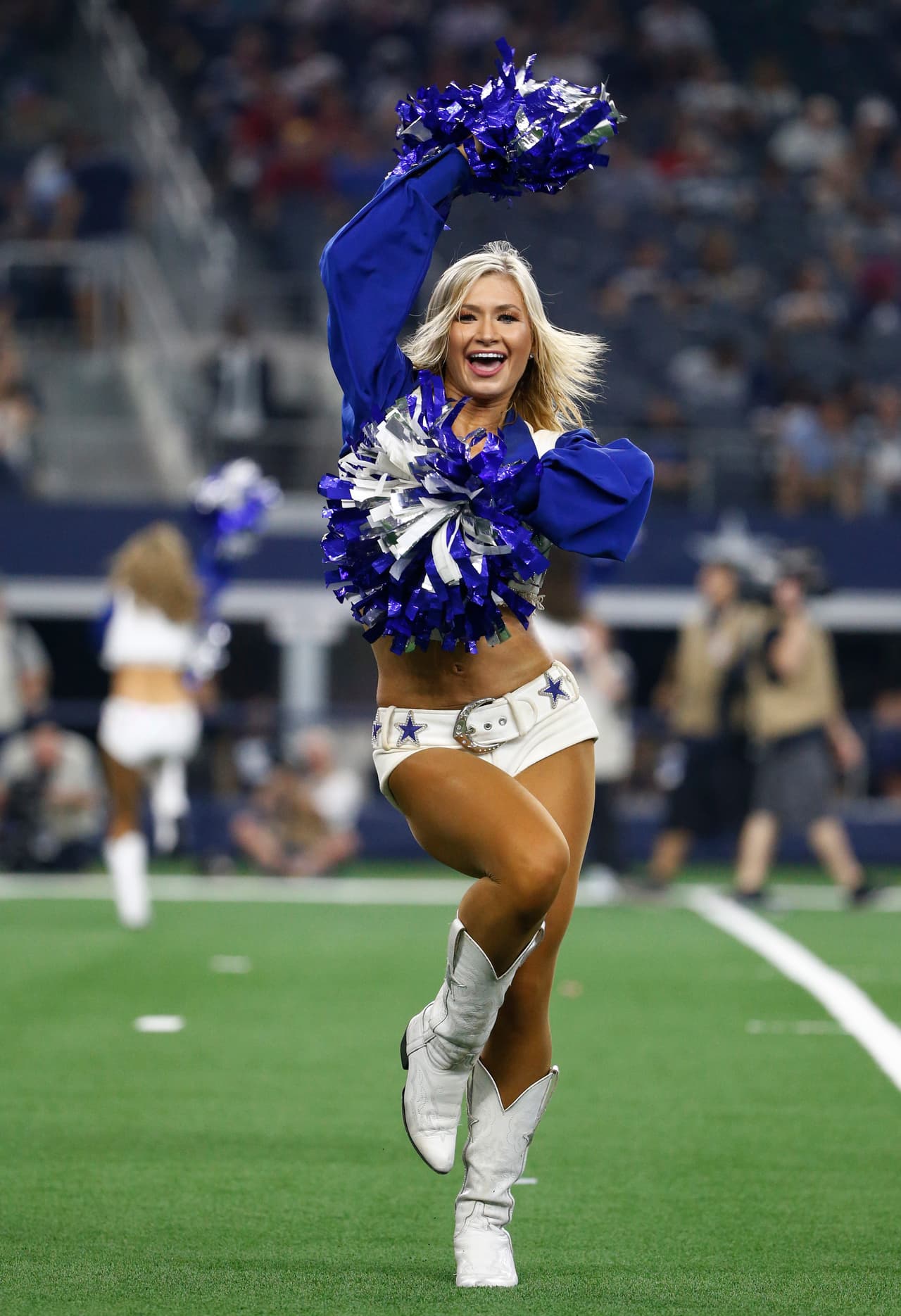 Dallas Cowboys cheerleaders perform during the second half of a preseason NFL football game against the Arizona Cardinals in Arlington, Texas, Sunday, Aug. 26, 2018. (AP Photo/Michael Ainsworth)