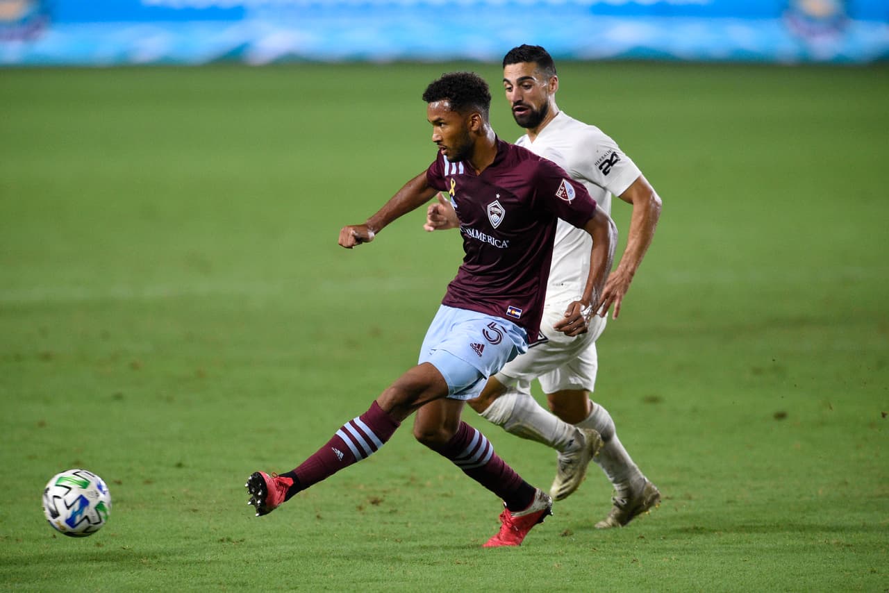 Sep 19, 2020; Carson, California, USA; Colorado Rapids defender Auston Trusty (5) passes the ball in front of LA Galaxy midfielder Sebastian Lletget (17) during the second half at Dignity Health Sports Park. Mandatory Credit: Kelvin Kuo-USA TODAY Sports