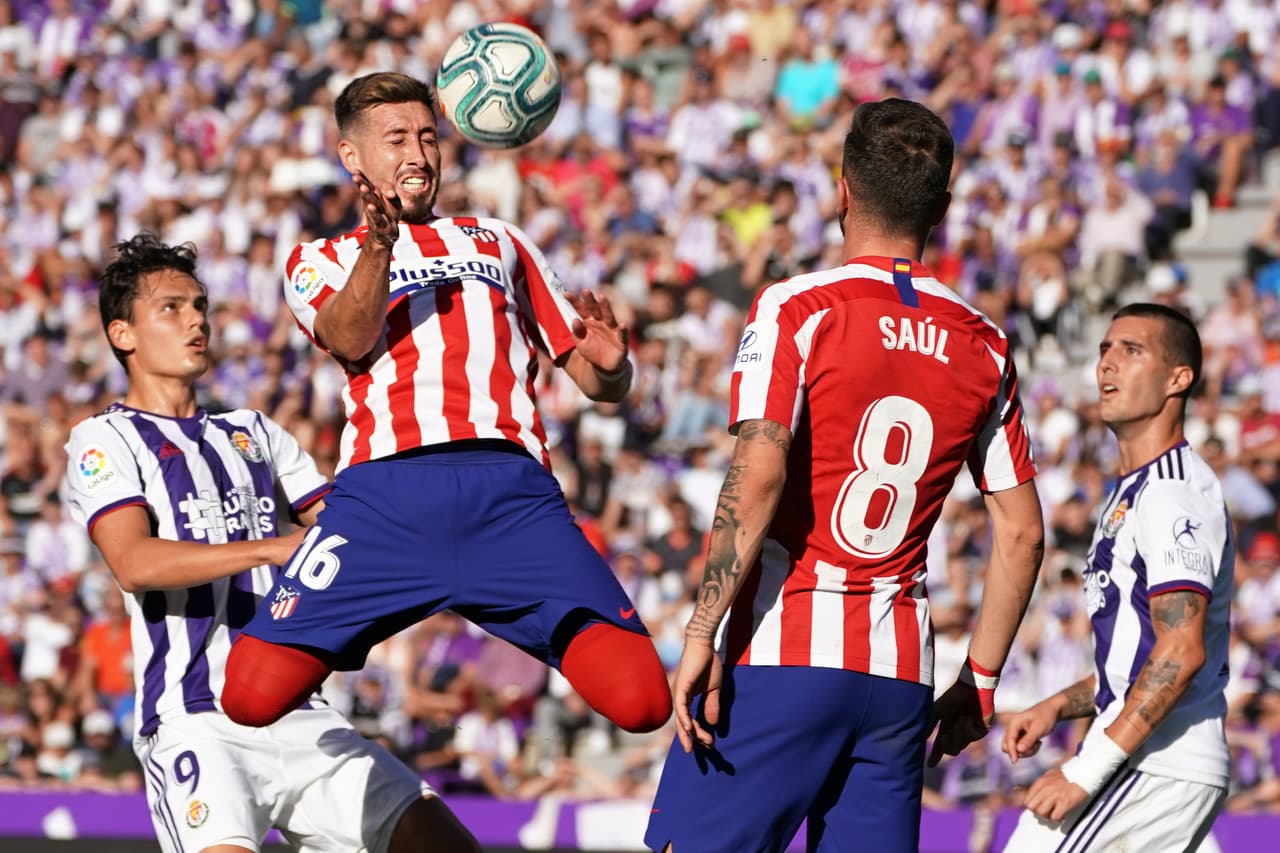 Real Valladolid's Turkish forward Enes Unal (L) vies with Atletico Madrid's Mexican midfielder Hector Herrera (2L) during the Spanish league football match between Real Valladolid FC and Club Atletico de Madrid at the Jose Zorilla stadium in Valladolid on October 6, 2019. (Photo by CESAR MANSO / AFP) (Photo by CESAR MANSO/AFP via Getty Images)