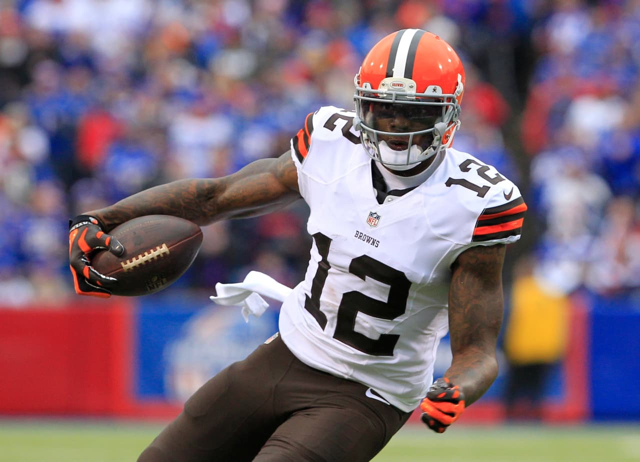 FILE - In this Nov. 30, 2014, file photo, Cleveland Browns wide receiver Josh Gordon makes a reception during an NFL football game against the Buffalo Bills in Orchard Park, N.Y. Recently reinstated by NFL Commissioner Roger Goodell following a lengthy drug suspension, Gordon said he's been changed by his experience over the past two years. He's grown up, learned from his mistakes and is ready to be productive again. (AP Photo/Bill Wippert, File)