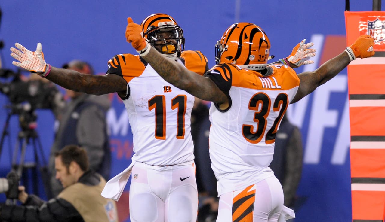 Cincinnati Bengals running back Jeremy Hill (32) celebrates with wide receiver Brandon LaFell (11) after scoring a touchdown against the New York Giants during the third quarter of an NFL football game, Monday, Nov. 14, 2016, in East Rutherford, N.J. (AP Photo/Bill Kostroun)