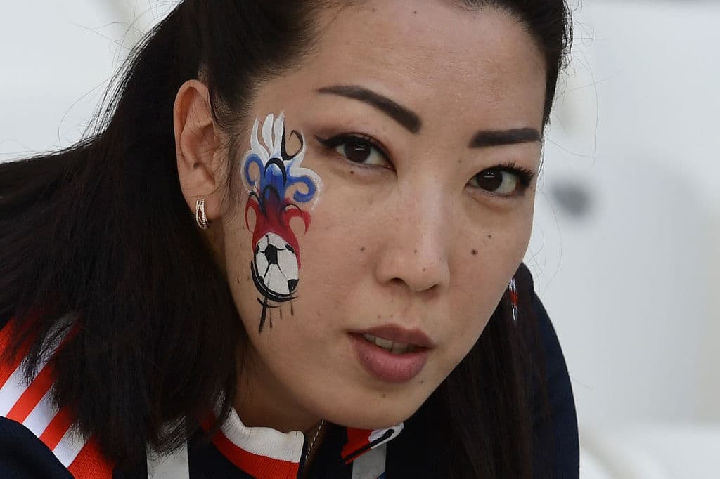 A fan waits for the start of the Russia 2018 World Cup Group A football match between Saudi Arabia and Egypt at the Volgograd Arena in Volgograd on June 25, 2018. (Photo by NICOLAS ASFOURI / AFP) / RESTRICTED TO EDITORIAL USE - NO MOBILE PUSH ALERTS/DOWNLOADS (Photo credit should read NICOLAS ASFOURI/AFP/Getty Images)