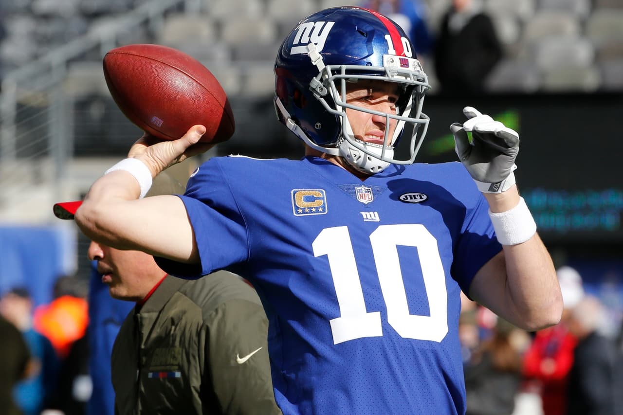 New York Giants quarterback Eli Manning throws a pass before an NFL football game against the Kansas City Chiefs Sunday, Nov. 19, 2017, in East Rutherford, N.J. (AP Photo/Kathy Willens)