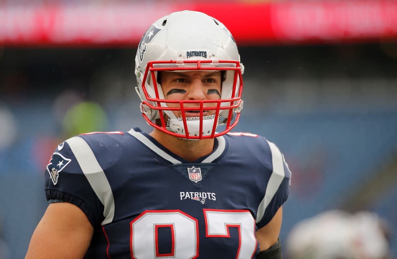 FOXBORO, MA - OCTOBER 29: Rob Gronkowski #87 of the New England Patriots looks on as he warms up before a game against the Los Angeles Chargers at Gillette Stadium on October 29, 2017 in Foxboro, Massachusetts. (Photo by Jim Rogash/Getty Images)