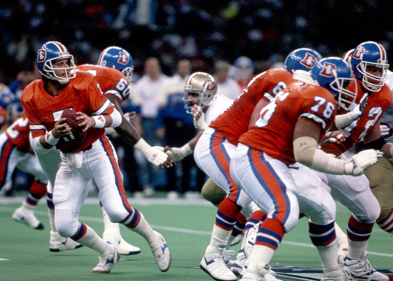 John Elway y los Denver Broncos tuvieron un partido para el olvido, pizarra 55 - 10 la peor paliza en la historia del Super Bowl.